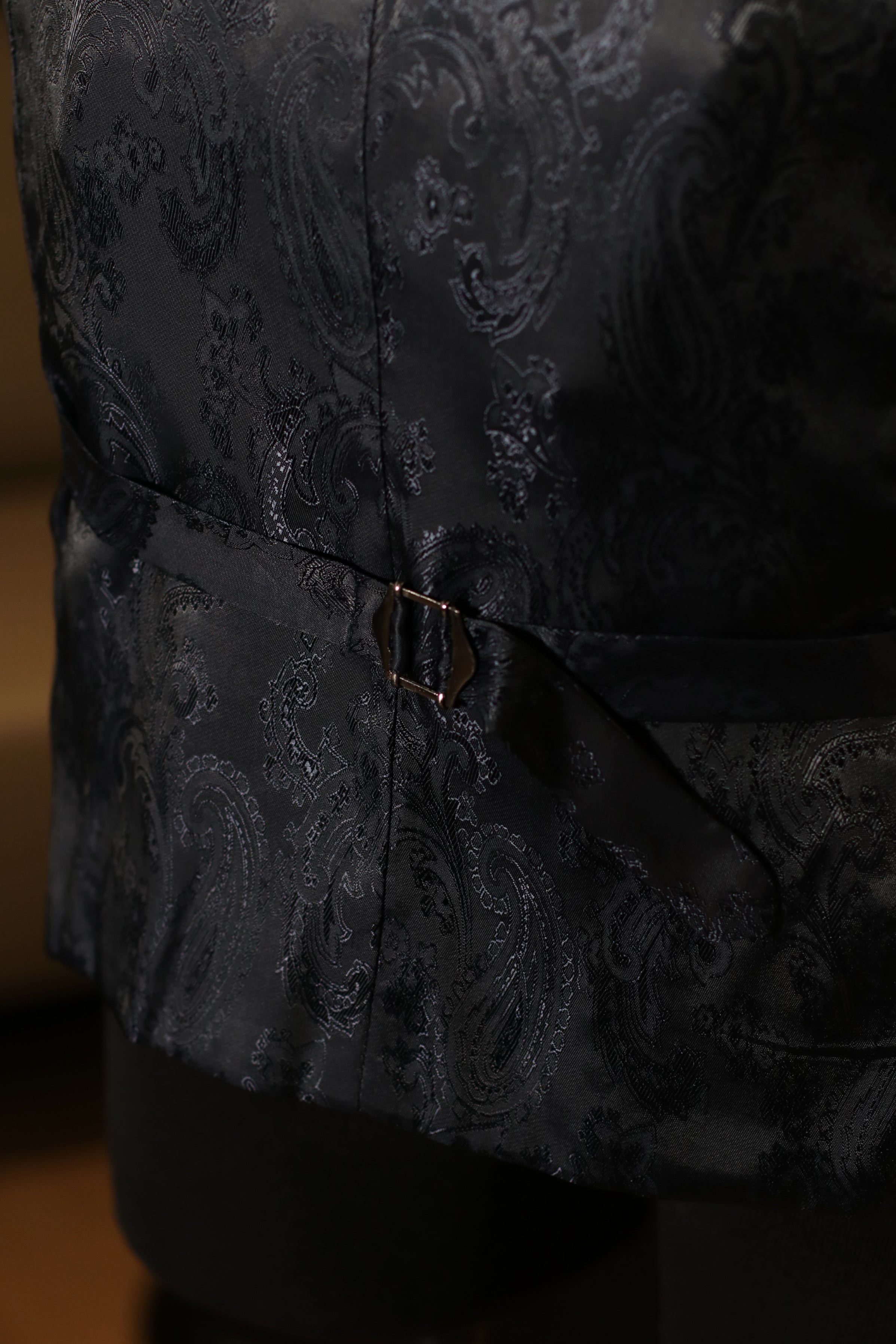 gilet-tweed-olijfgroen-achterkant